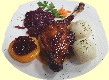 Ración de Ganso Navideño con guarniciones